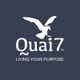 Logo mit Möwe und Text "Quai7. Living Your Purpose" auf dunkelblauem Hintergrund.