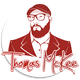 Stylized illustration of a bearded man in glasses, hat, and suit with "Thomas McKee" text.