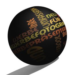 Schwarze Kugel mit bunten, deutschen Wörtern wie "Präsentation", "Fotografie" und "Werbung".