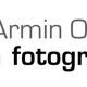 Logo mit dem Text "Armin Okulla Fotograf" und blauen Quadraten darunter.