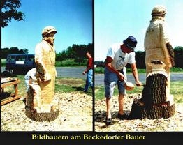 Holzbildhauer schnitzt im Freien an einer großen Skulptur, mit einem Mann in Aktion.