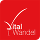 Rotes Logo mit weißem Text "Vital Wandel" und geschwungenem Häkchen über dem "V".