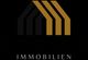 Logo mit stilisiertem Dach, Text: SEIDLER IMMOBILIEN, in Schwarz und Gold auf schwarzem Hintergrund.