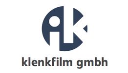 Logo der Klenkfilm GmbH mit stilisiertem „k“ und „f“ in einem blauen Kreis.