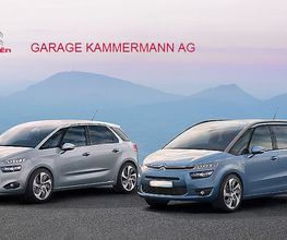 Zwei Citroën-Fahrzeuge auf einer Straße vor Hügeln, mit Logo der Garage Kammermann AG.