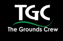 Logo with "TGC" and "The Grounds Crew" text on a black background with a green swoosh.