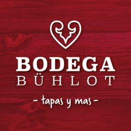 Rotes Logo der Bodega Bühlot mit Herz und Text "tapas y mas".