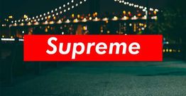Red "Supreme" logo over a blurred night cityscape with a lit bridge in the background.