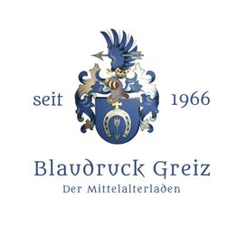 Wappen mit blauen und goldenen Elementen. Text: "seit 1966 Blaudruck Greiz Der Mittelalterladen".