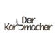 Logo mit stilisiertem Text "Der Korbmacher" in moderner Schriftart auf weißem Hintergrund.
