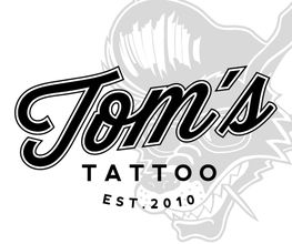 TOM`S TATTOO | München Logo