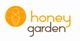Logo mit einer Biene in einem orangefarbenen Kreis und dem Text "honey garden" daneben.