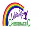 Rainbow above "Vitality Chiropractic" with a jumping figure.