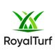 Logo with green grass blades above the text "RoyalTurf" on a white background.