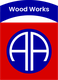 "Wood Works logo with blue and red colors, featuring stylized, white AA letters in a circle."