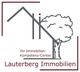 Logo von Lauterberg Immobilien mit Baum und Hausumriss. Text: "Ihr Immobilien-Kompetenz-Center".