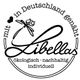 Runder "Libellas"-Aufnäher mit Libelle, Herz und Schlagwörtern: ökologisch, nachhaltig, individuell.