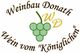 Logo von Weinbau Donath mit Trauben und Text "Wein vom 'Königlichen'", Initialen WD.