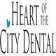 Logo with text "Heart of the City Dental" and a small teal heart icon.