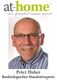 Mann mit Brille und Hemd lächelt. Text: "at-home" und "Peter Huber, Baubiologischer Standortexperte".