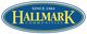 Hallmark Communities logo, established in 1984, with yellow text on a blue oval background.