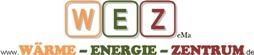 Logo mit den Buchstaben WEZ, darunter steht "Wärme - Energie - Zentrum" in verschiedenen Farben.