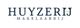Logo van Huyzerij Makelaardij, witte achtergrond, zwarte en gele accenten.