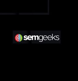 Logo of "semgeeks" with a colorful target icon on a black background.