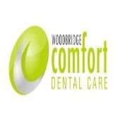Green and silver logo of Woodbridge Comfort Dental Care with text on the right.