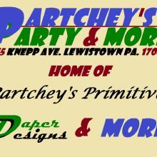 Colorful business sign for Dartchey's Party & More at 215 Knepp Ave, Lewistown, PA.