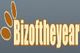 Logo with text "Bizoftheyear" and paw print design on a gray background.