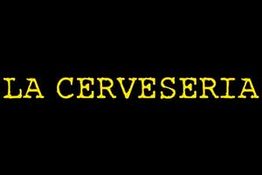 Texto amarillo "LA CERVESERIA" sobre un fondo negro.