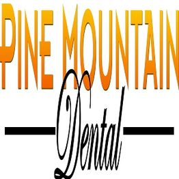 "Pine Mountain Dental logo with orange gradient text and stylized black 'Dental' script."