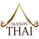 Logo con testo "Maison Thai" e decorazioni dorate che formano un tetto stilizzato.