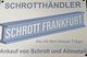 Schild: „Schrotthändler Frankfurt, Ankauf von Schrott und Altmetall, Die mit dem blauen Träger“.