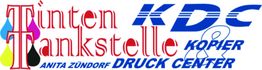 Tinten Tankstelle KDC Logo mit bunten Farbklecksen und Text in Rot und Blau.