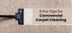 Vacuum cleaner on carpet with text: "5 Pro Tips for Commercial Carpet Cleaning."
