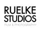 Logo mit Text "RUELKE STUDIOS FILM & PHOTOGRAPHY" in Schwarz auf Weiß.