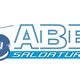 Logo "ABIE SALDATURE" con disegno di maschera da saldatura blu.