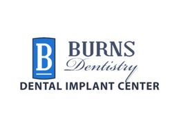 Burns Dentistry Dental Implant Center logo featuring a blue "B" on the left.