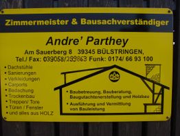 Andre' Parthey Firmenschild: Zimmerei, Bautätigkeiten und Beratung in Bülsringen, gelb-schwarz.