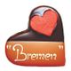 Schokoladenherz mit rotem Zuckerherz und Schriftzug "Bremen".
