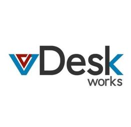 vDesk logo with blue and black text, featuring a red and blue triangular design element.