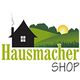 Logo: Schwarzes Haus, grüne Landschaft, gelbe Sonne. Text: "Hausmacher Shop".