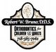 Sign for Robert W. Bruno, D.D.S., orthodontics for children and adults, phone 718-565-7242.