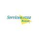 ServiceMaster Restore logo in green and yellow text with a yellow triangle in the background.