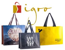 Drei bunte Einkaufstaschen mit Logo und Beschriftungen vor einem "igro" Schriftzug.