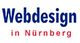 Text "Webdesign in Nürnberg" in blauen und roten Buchstaben auf weißem Hintergrund.
