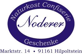Logo mit Text: "Naturkost Confiserie Noderer Geschenke, Marktstr. 14, 91161 Hilpoltstein".
