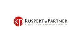 Logo mit rotem Kreis, "kp", Text: "Küspert & Partner, Kanzlei für Versicherungen & Finanzen".